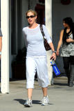 th_52520_Preppie_-_Christina_Applegate_walking_with_her_personal_trainer_in_L.A._-_Feb._17_2010_1126_122_412lo.jpg