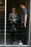 lie Minogue leaving recording studio and returning back home, London