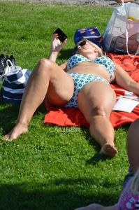 Milf-bikini-spread-her-legs-in-the-grass-52c53anxj7.jpg